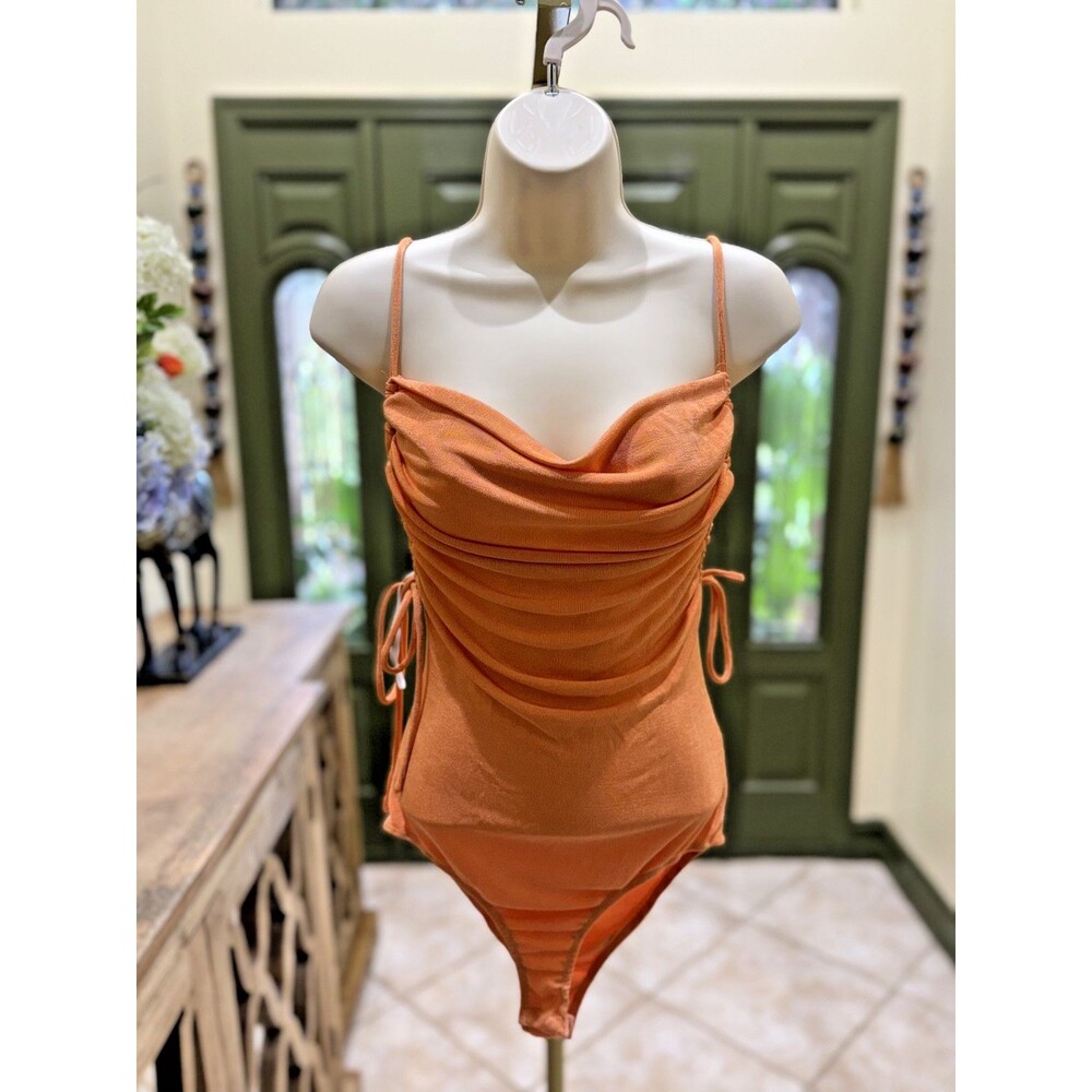 Princess Polly orange one piece bodysuit size 6